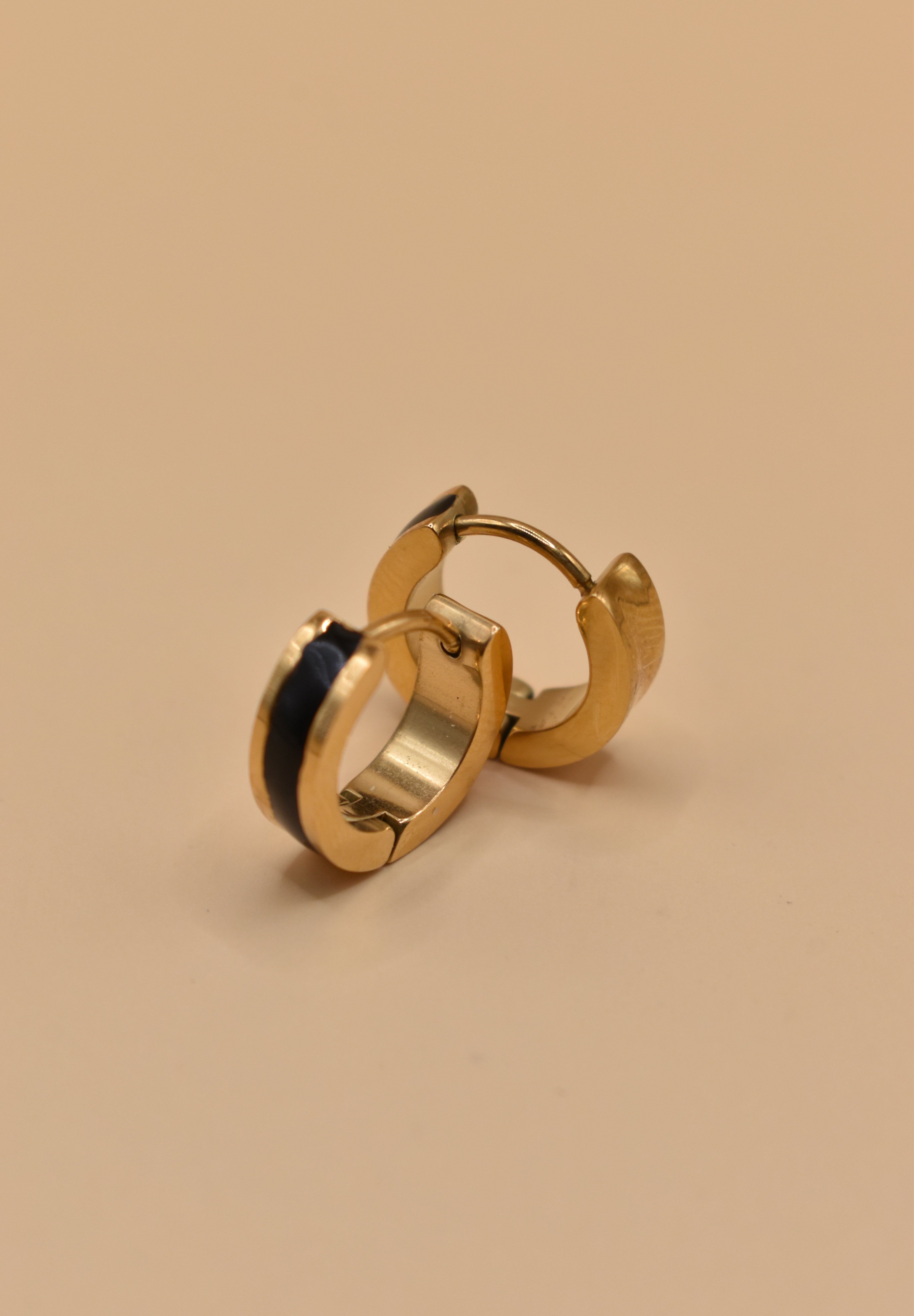 Circle charm enamel huggies earrings with smooth gold clasp