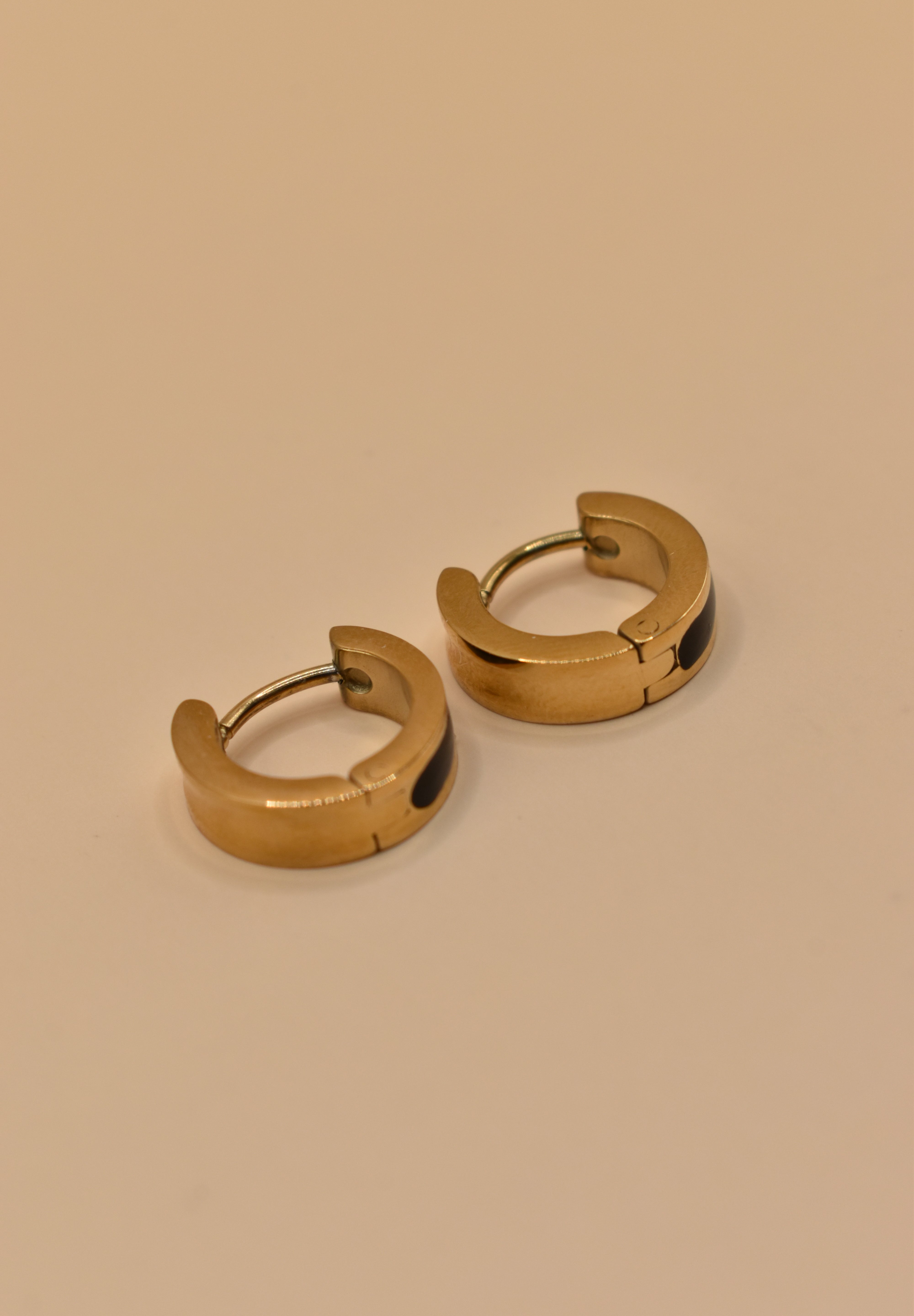 Circle charm enamel huggies earrings with smooth gold clasp
