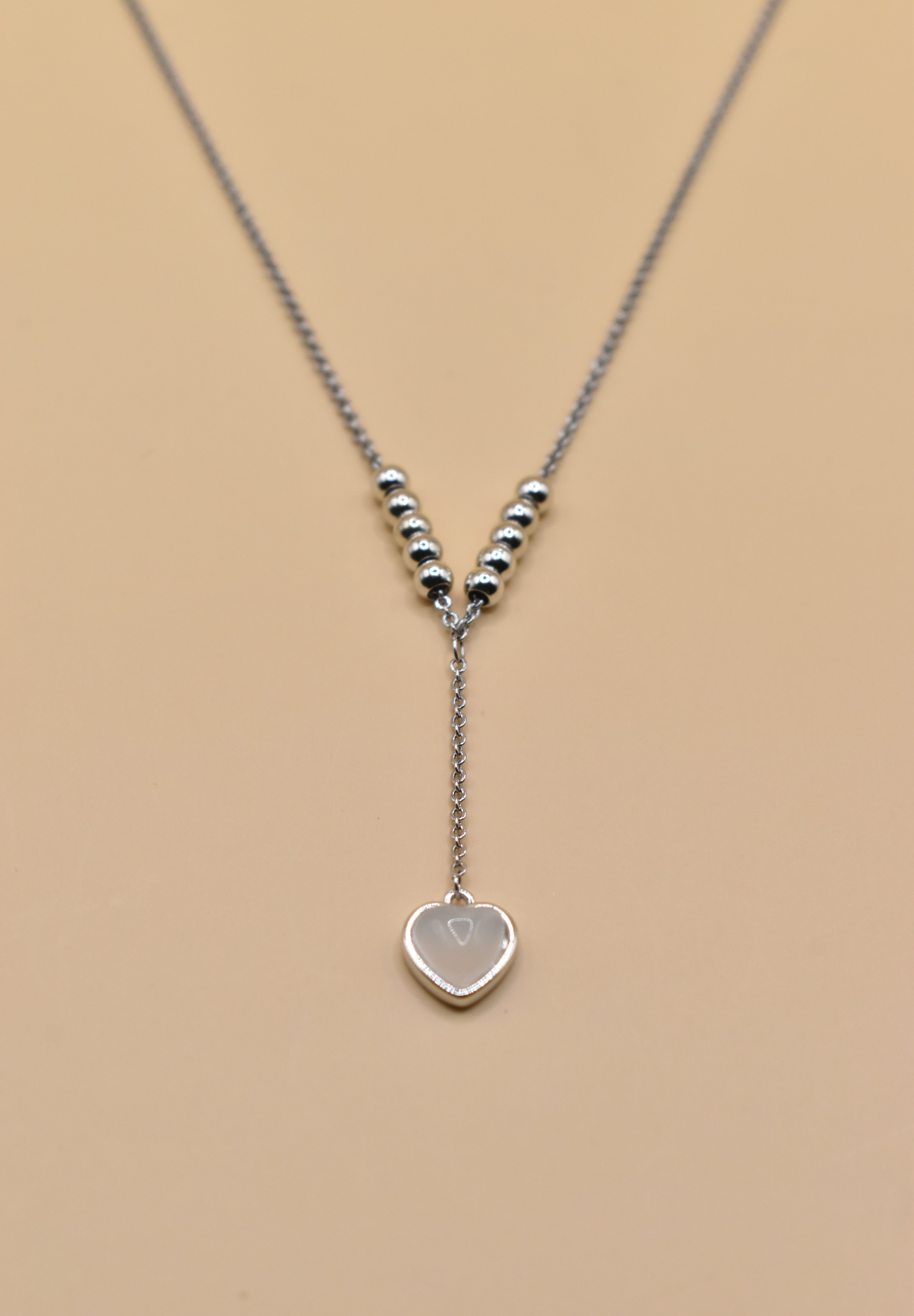 Heart necklace in rhodium stainless steel with drop pendant