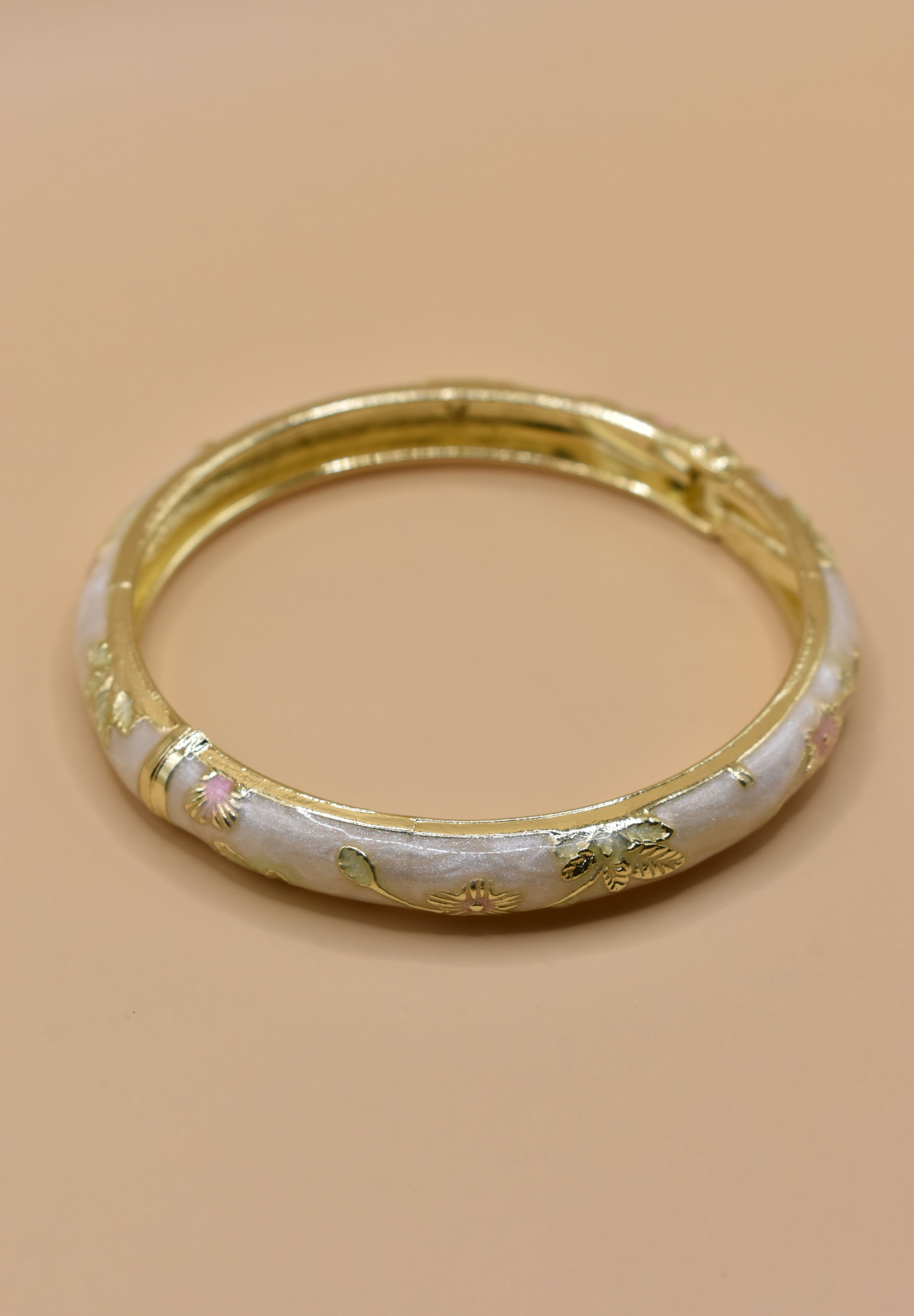 Vintage gold bangle bracelet with smooth round design