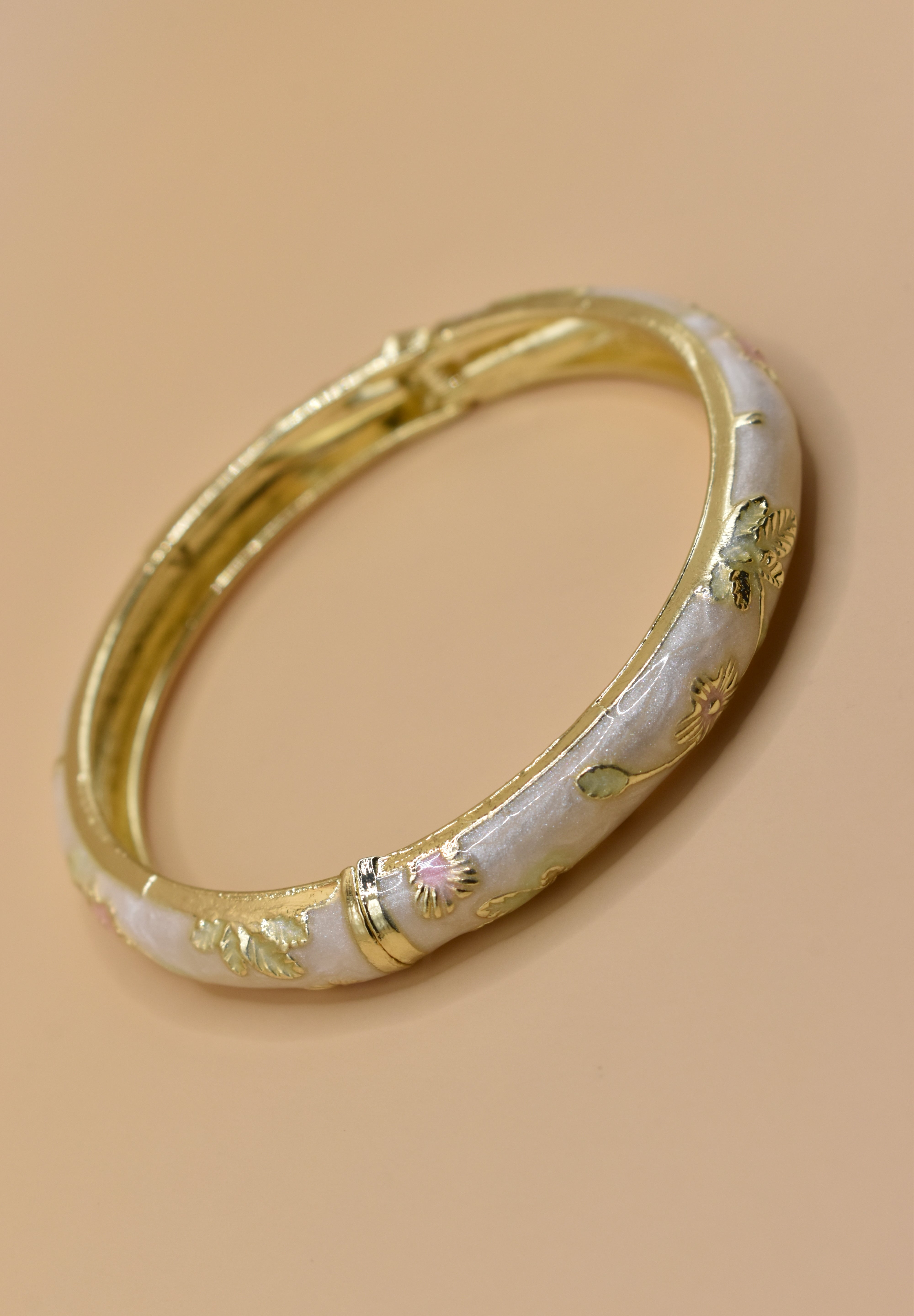 Vintage gold bangle bracelet with smooth round design