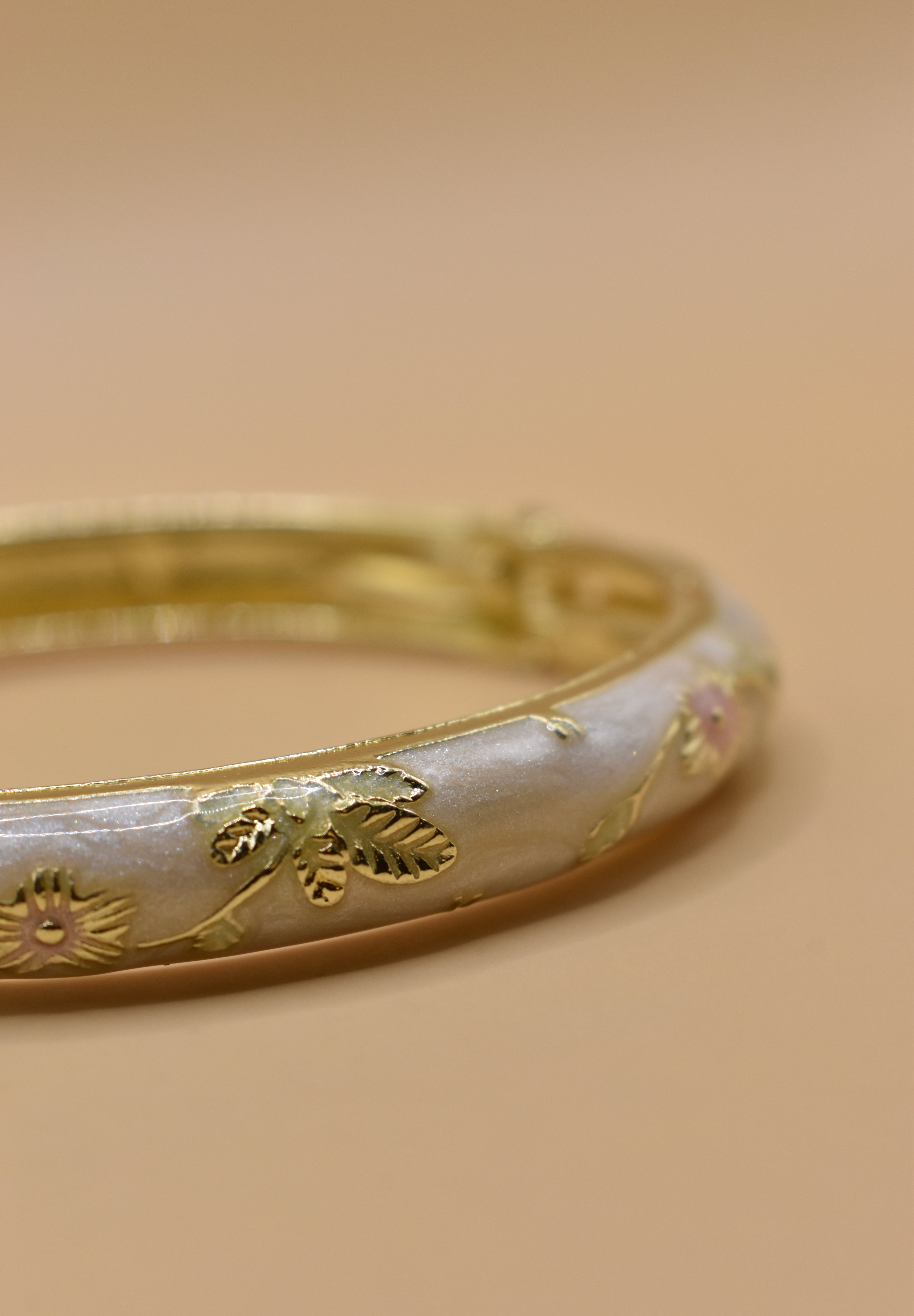 Vintage gold bangle bracelet with smooth round design