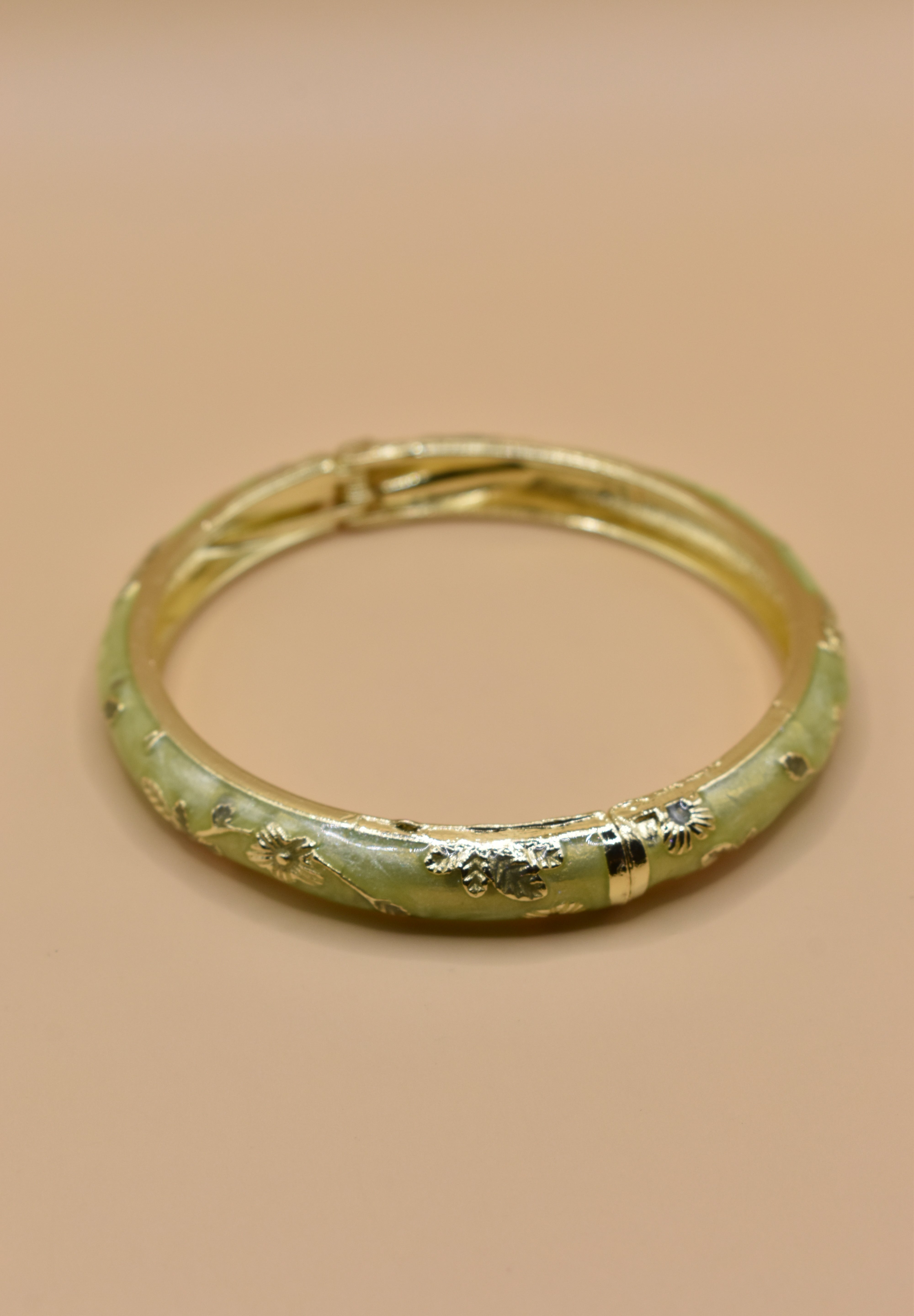 Vintage gold bangle bracelet with smooth round design