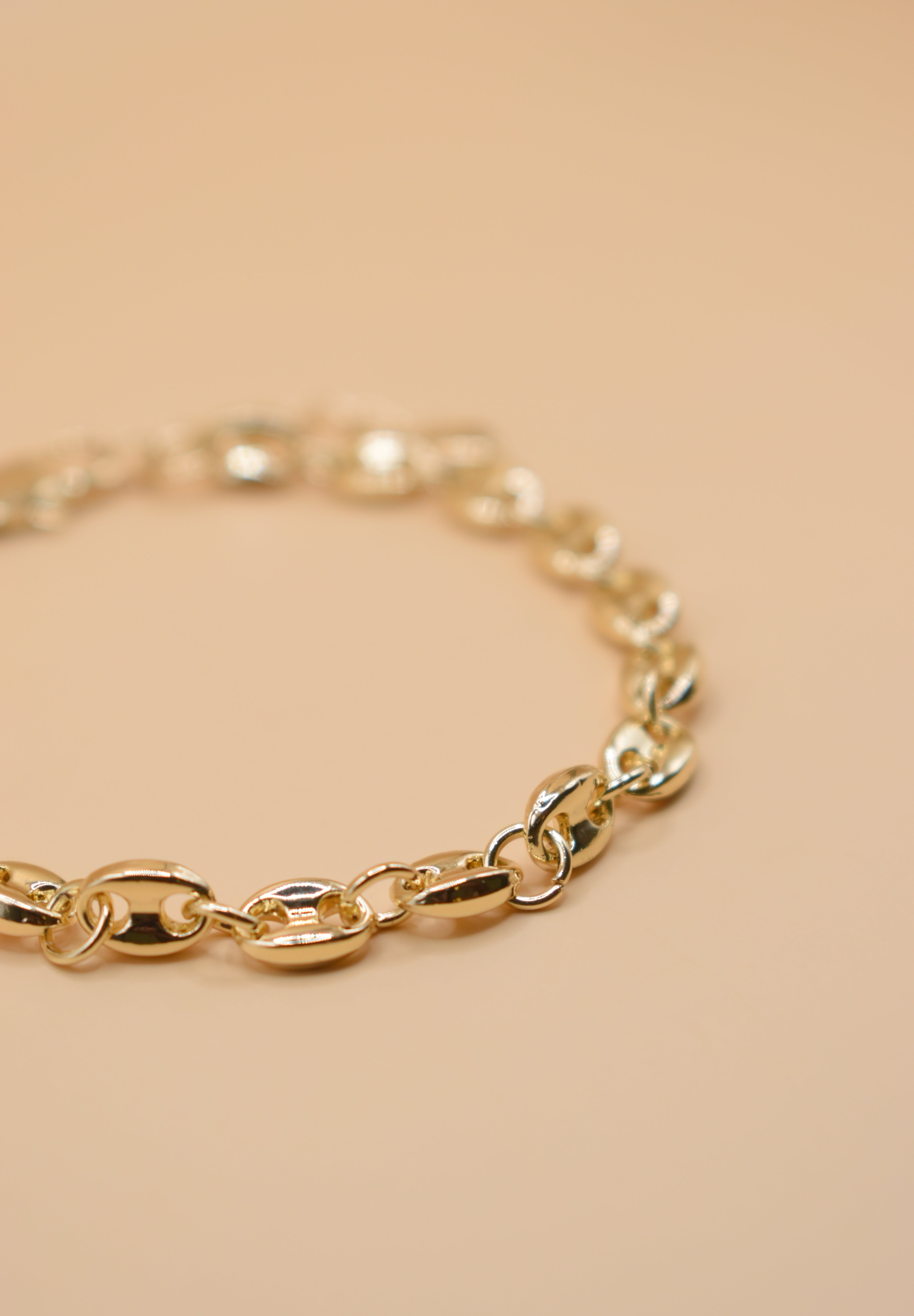 Gold G-Link bracelet with thick chain and secure clasp