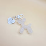 White balloon dog bag charm with gold clip for handbags