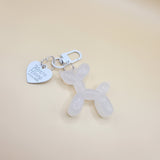 White balloon dog bag charm with gold clip for handbags