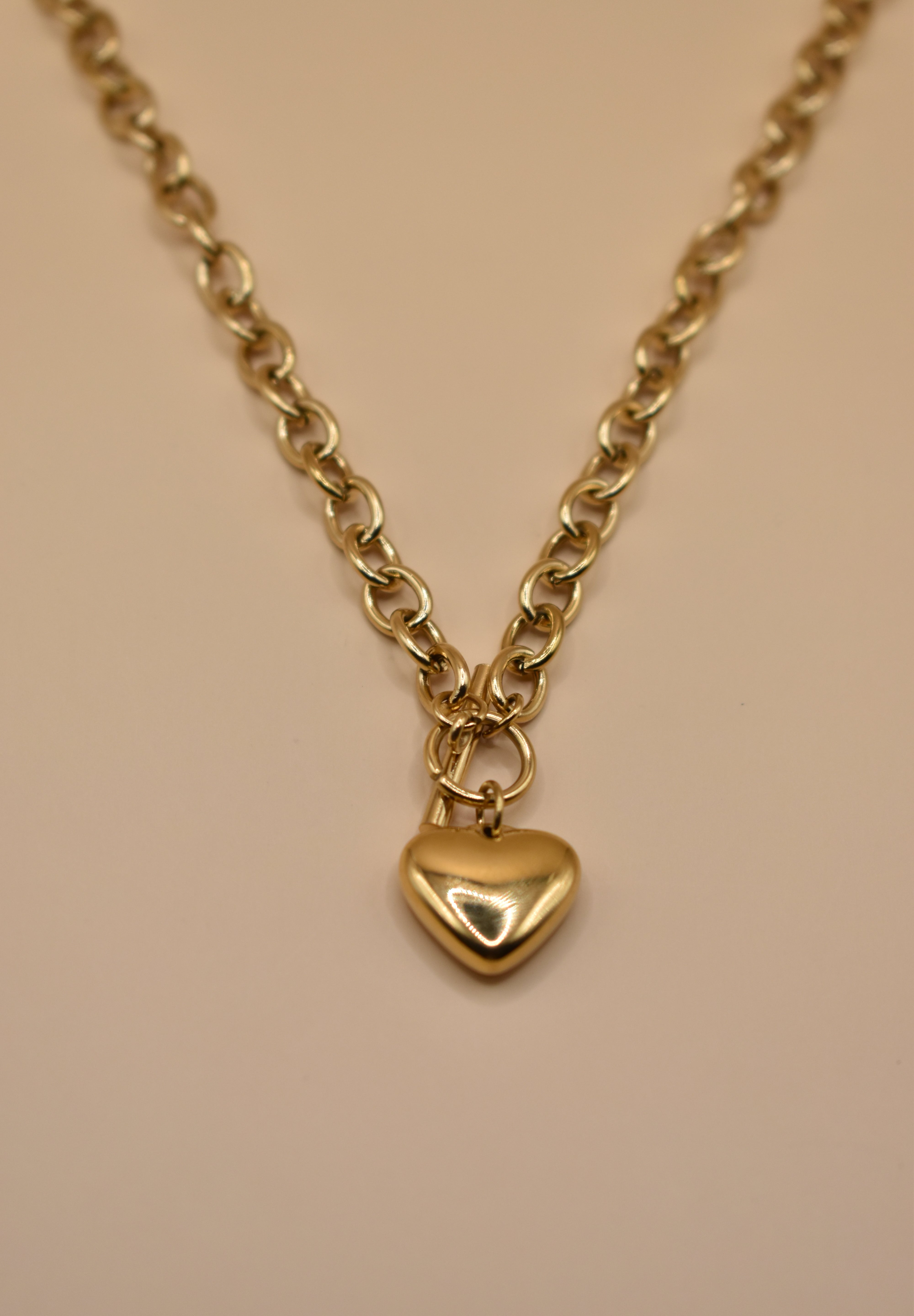 Gold heart pendant necklace on 18K plated chain