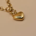 Gold heart pendant necklace on 18K plated chain