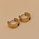 Circle charm enamel huggies earrings with smooth gold clasp