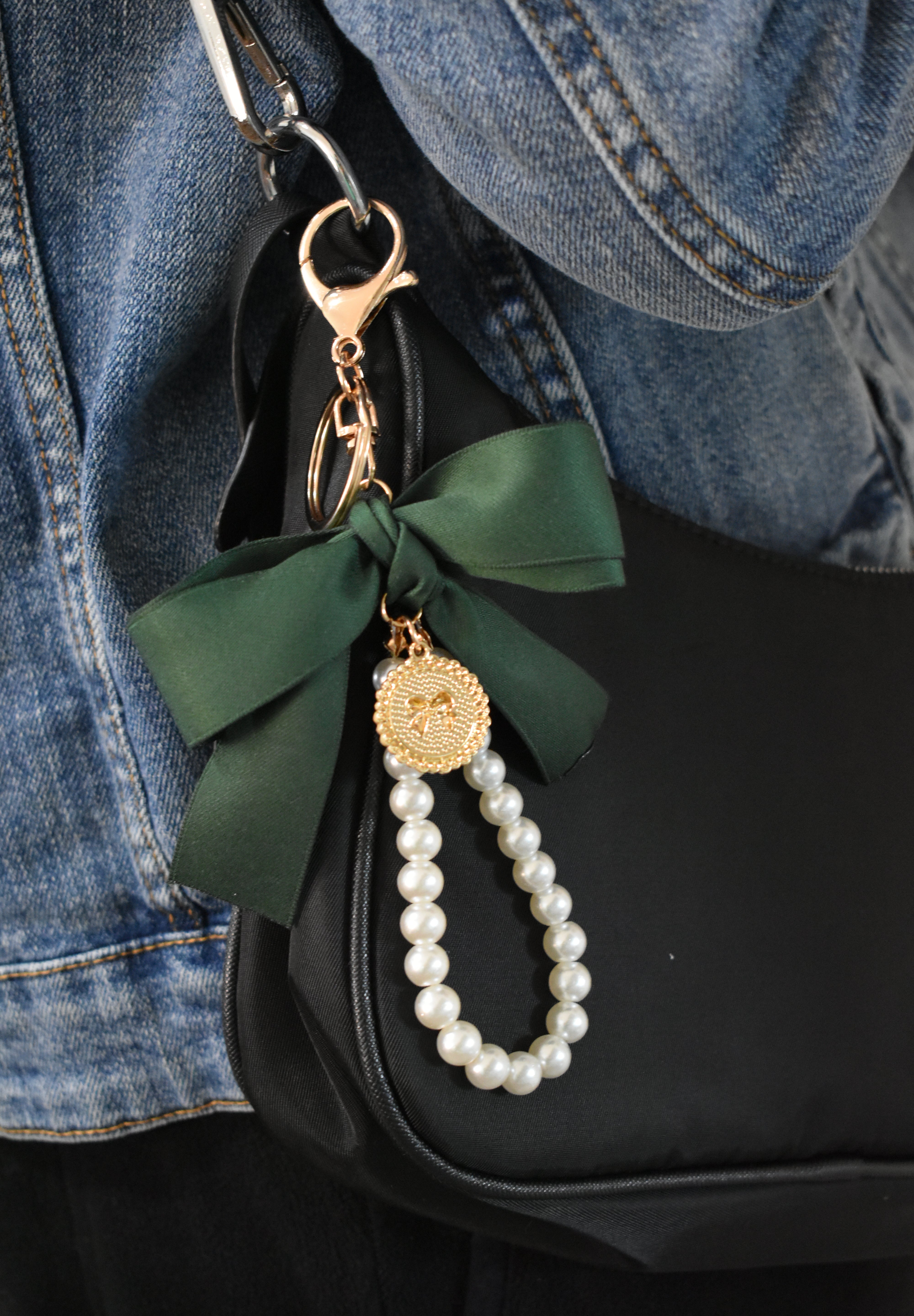Gold bow with pearl bag charm clip accessory