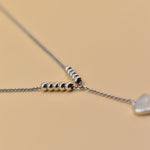 Heart necklace in rhodium stainless steel with drop pendant