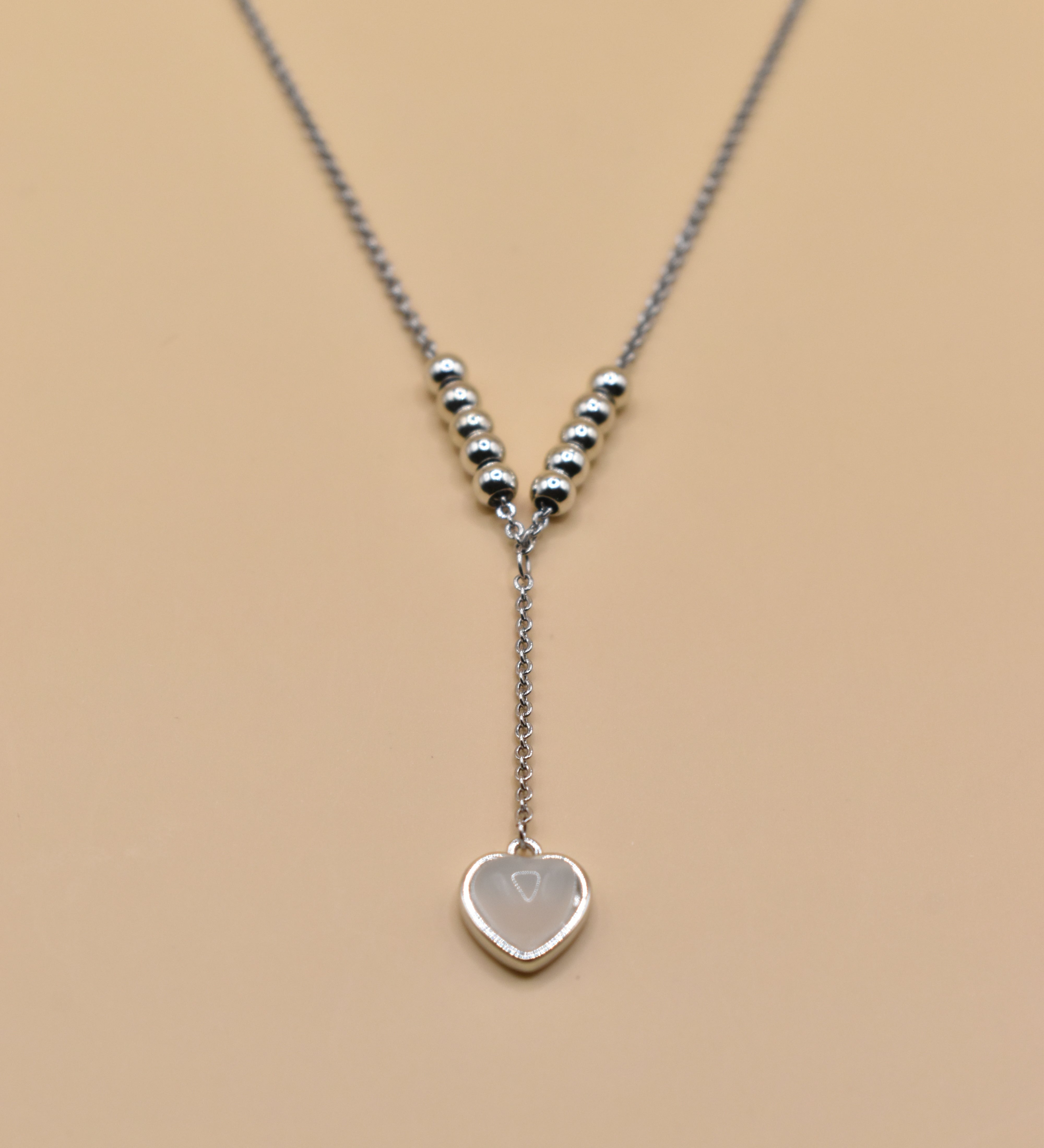 Heart necklace in rhodium stainless steel with drop pendant