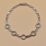 White gold cubic zirconia bracelet with five circle links