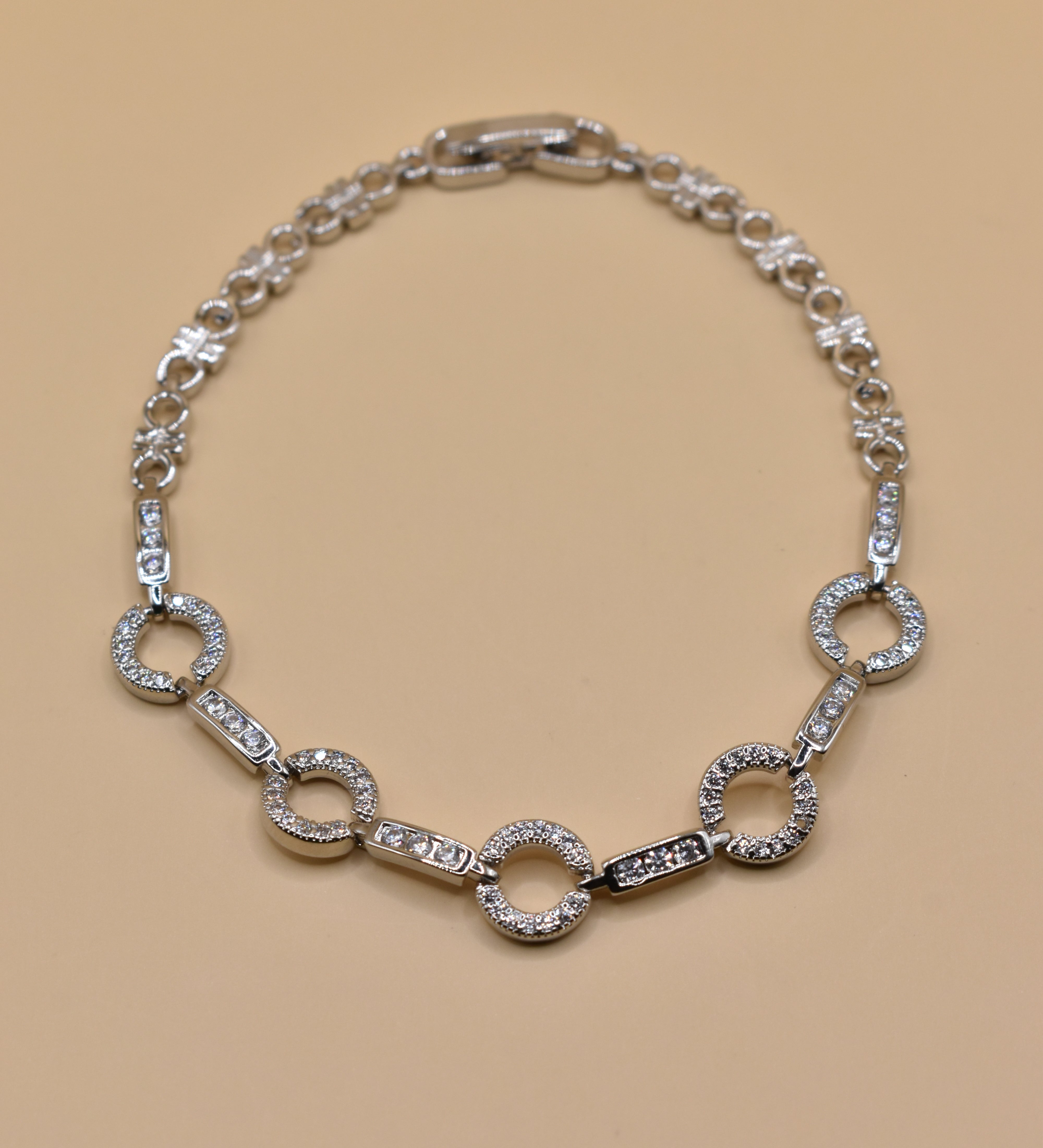 White gold cubic zirconia bracelet with five circle links