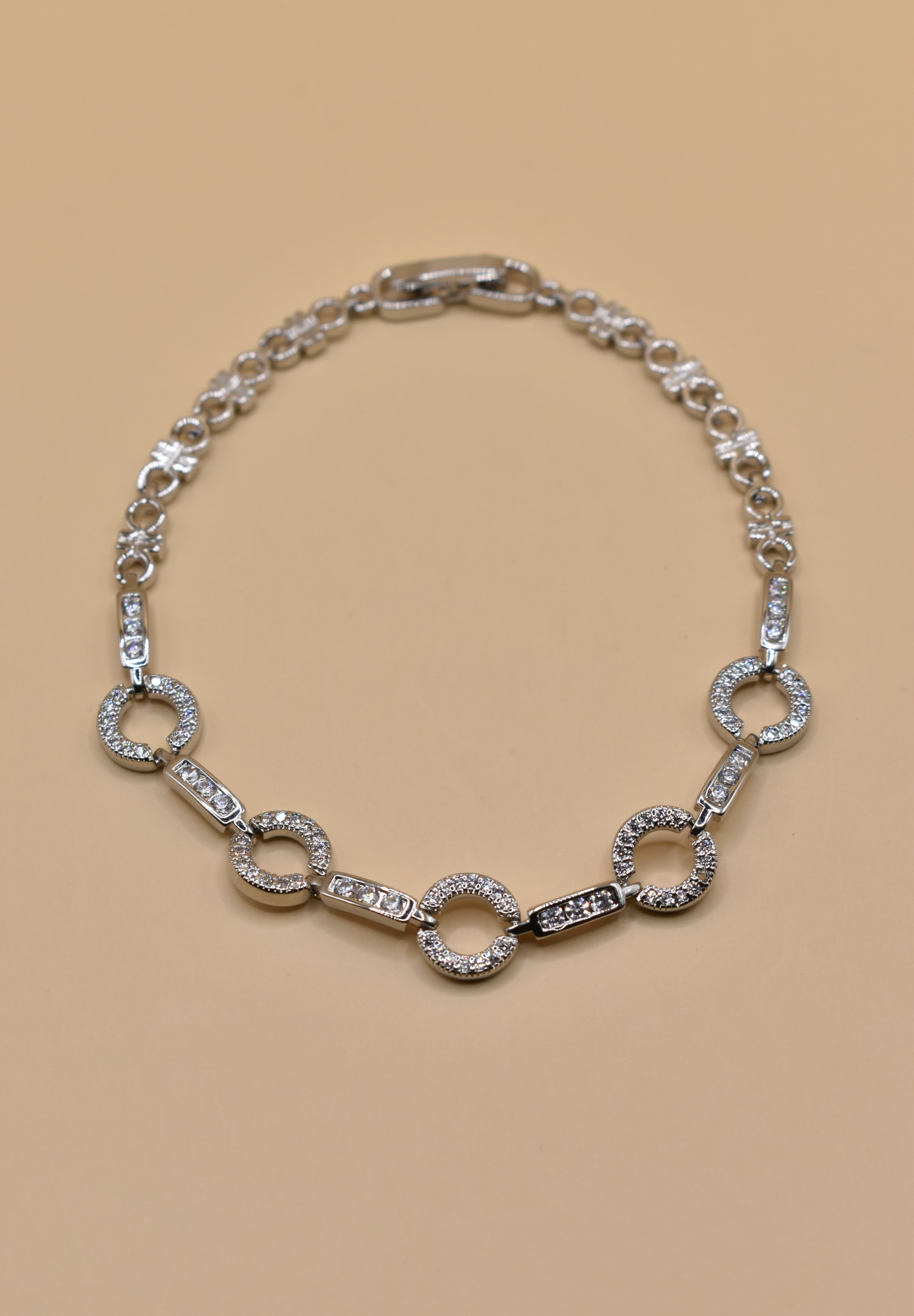 White gold cubic zirconia bracelet with five circle links