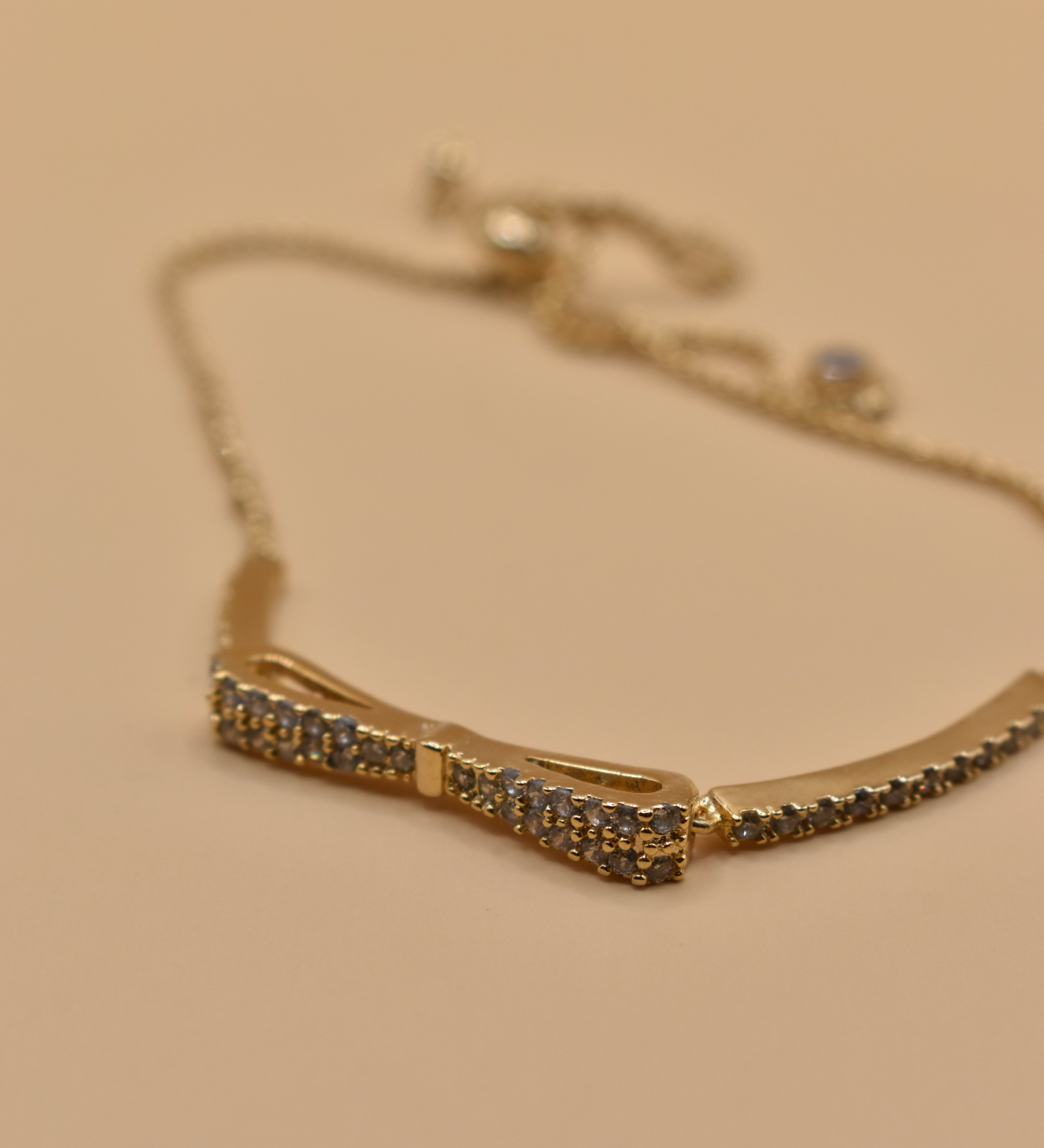 Gold Bow CZ Bracelet Adjustable with cubic zirconia charm