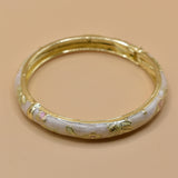 Vintage gold bangle bracelet with smooth round design