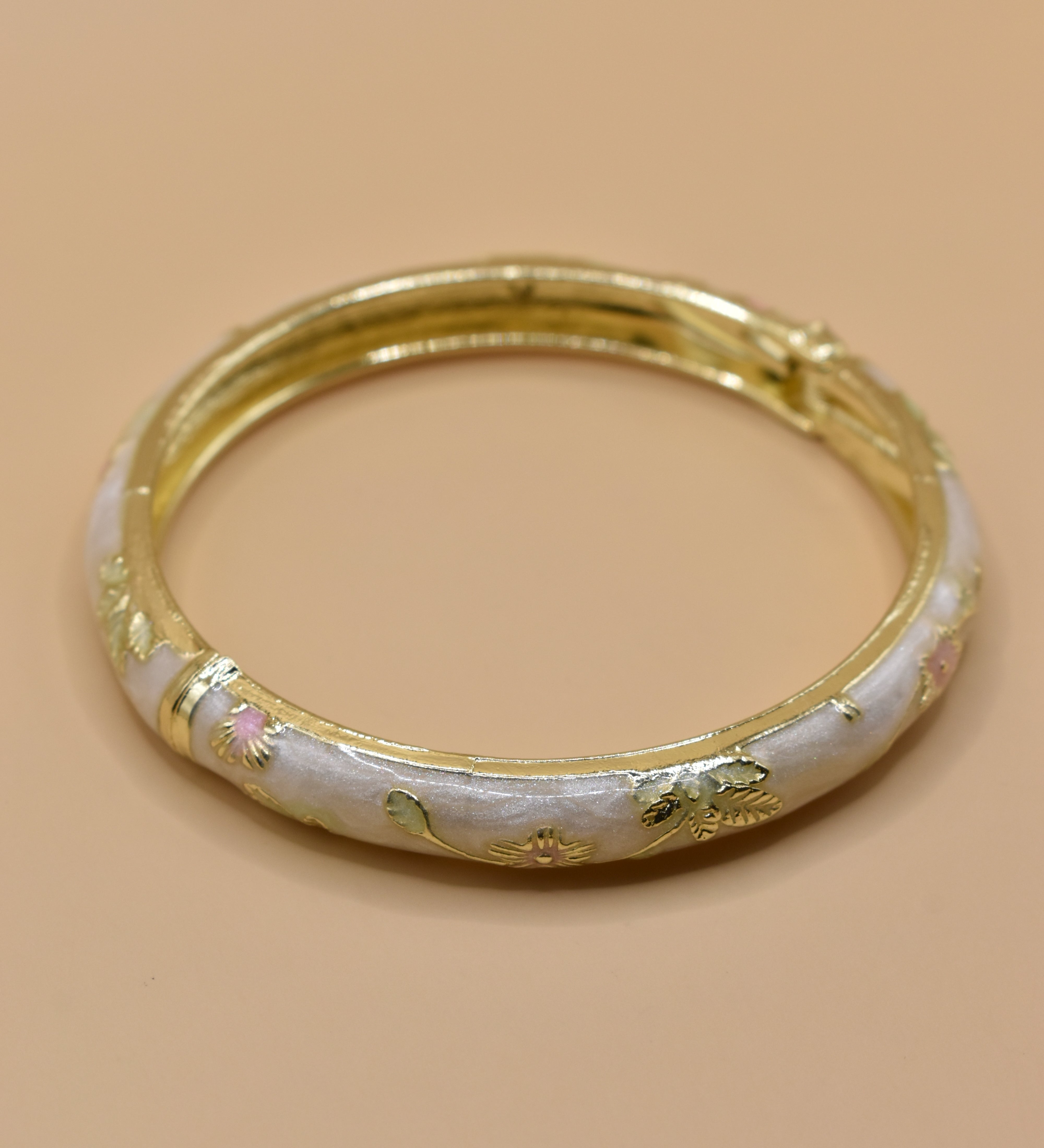 Vintage gold bangle bracelet with smooth round design