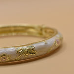 Vintage gold bangle bracelet with smooth round design