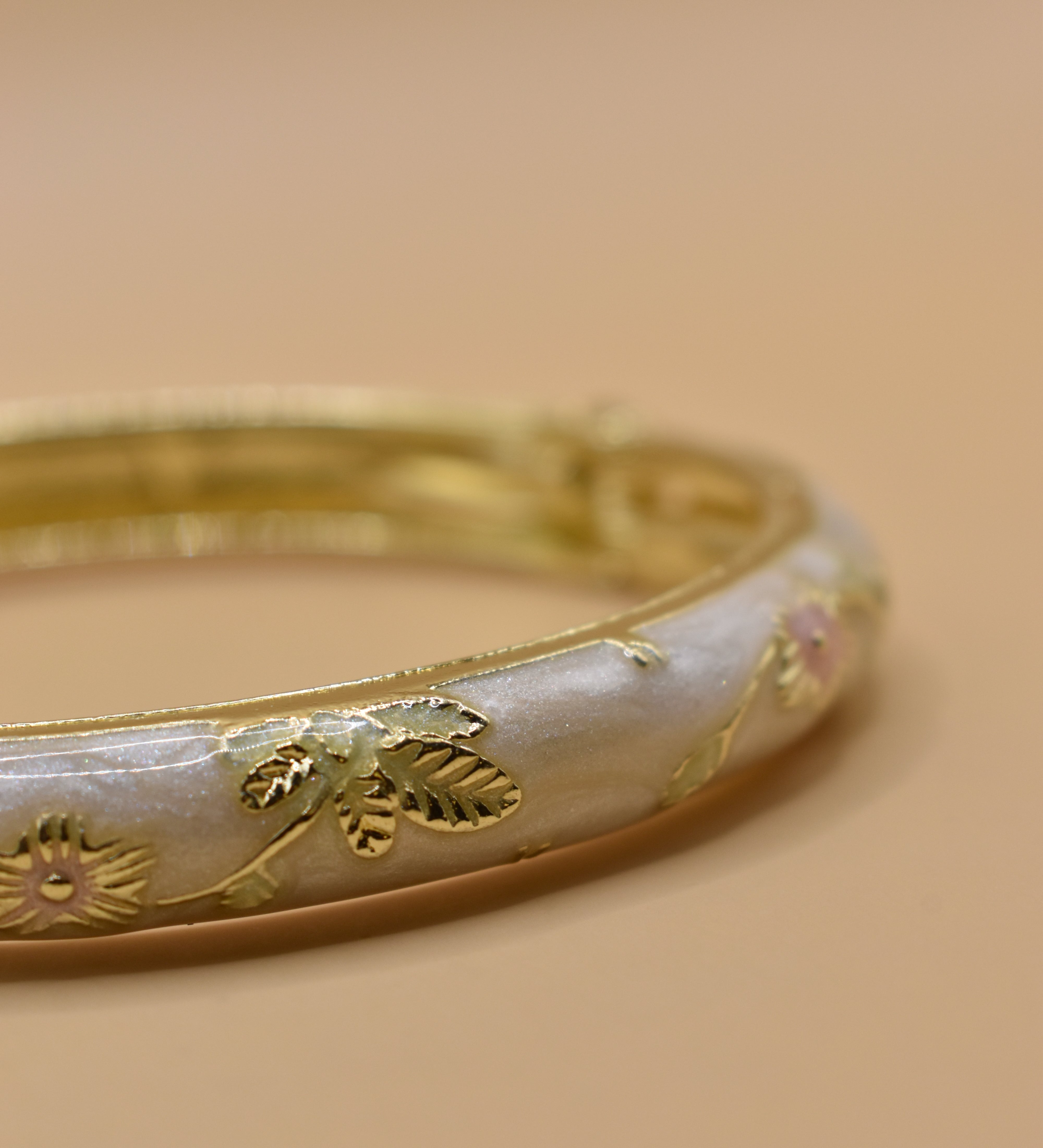 Vintage gold bangle bracelet with smooth round design
