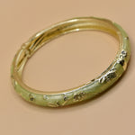 Vintage gold bangle bracelet with smooth round design