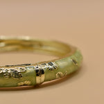 Vintage gold bangle bracelet with smooth round design