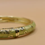 Vintage gold bangle bracelet with smooth round design