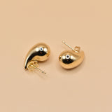 Small gold tear drop earrings in stainless steel finish