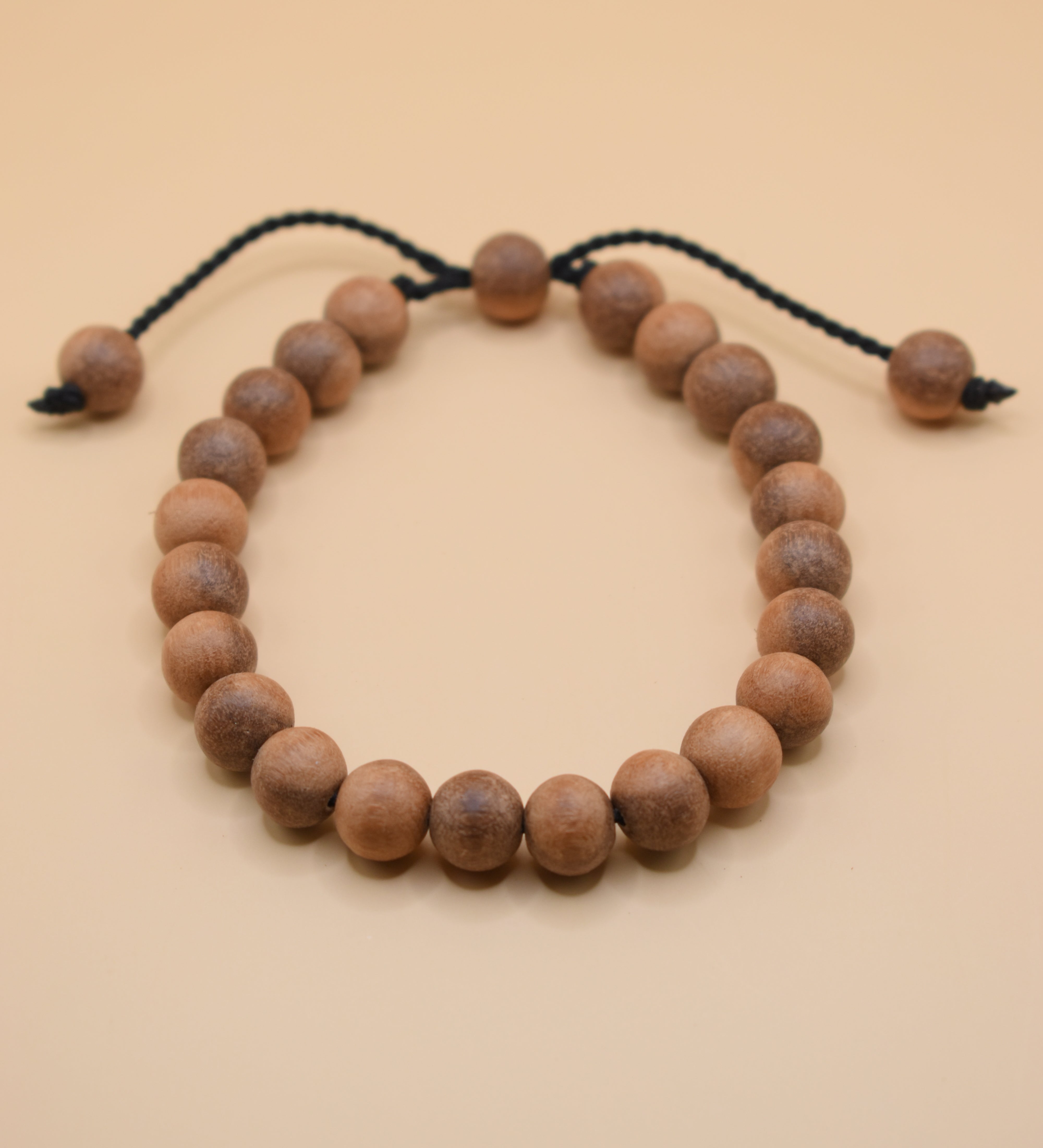 Adjustable handmade bead bracelet with wood accents