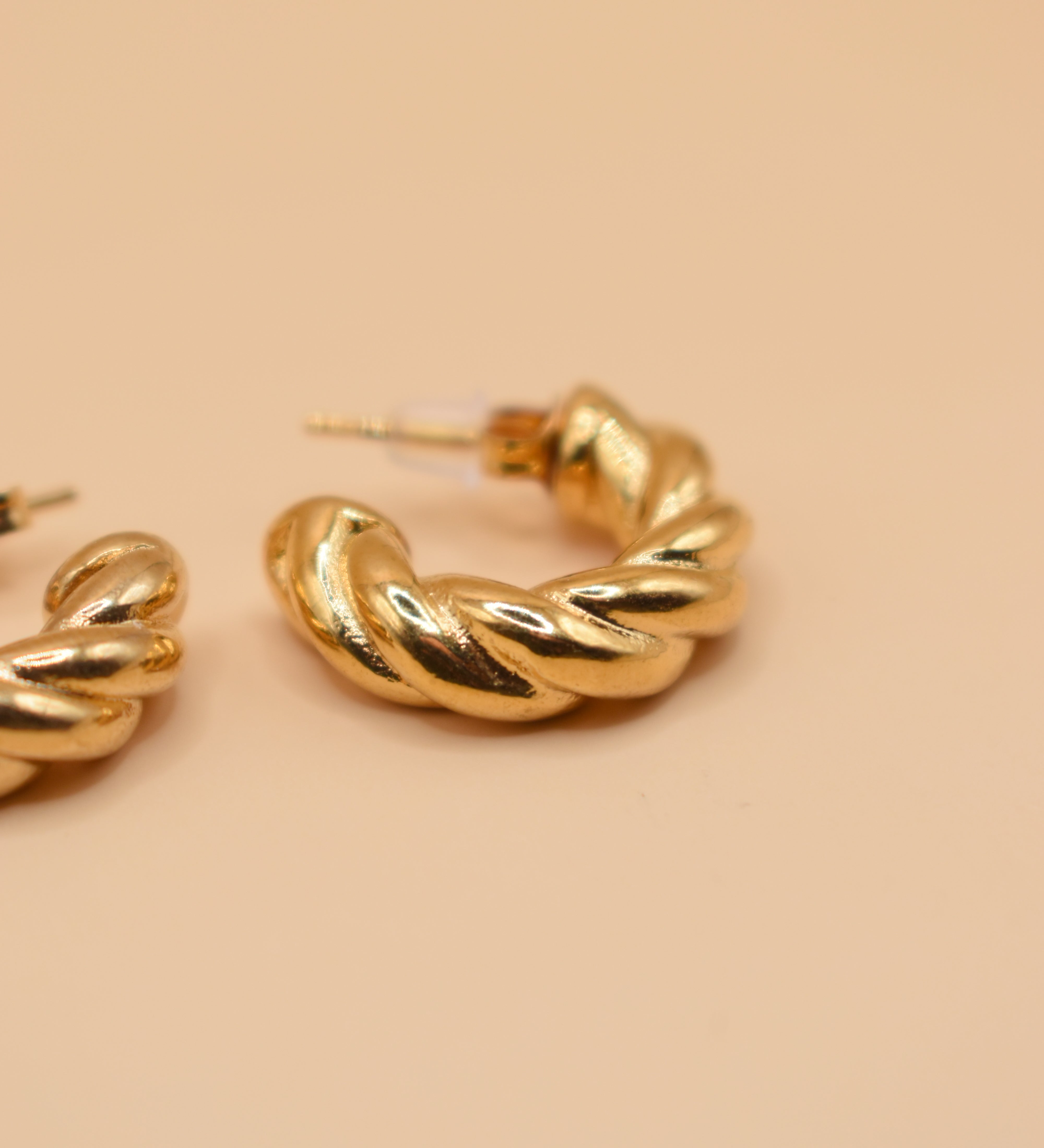 Gold twisted stud earrings with woven hypoallergenic design